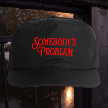 SOMEBODY'S PROBLEM NYLON SNAPBACK CAP